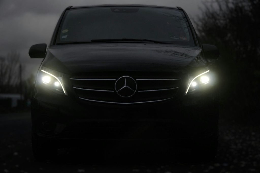 Front view of a black Mercedes-Benz van